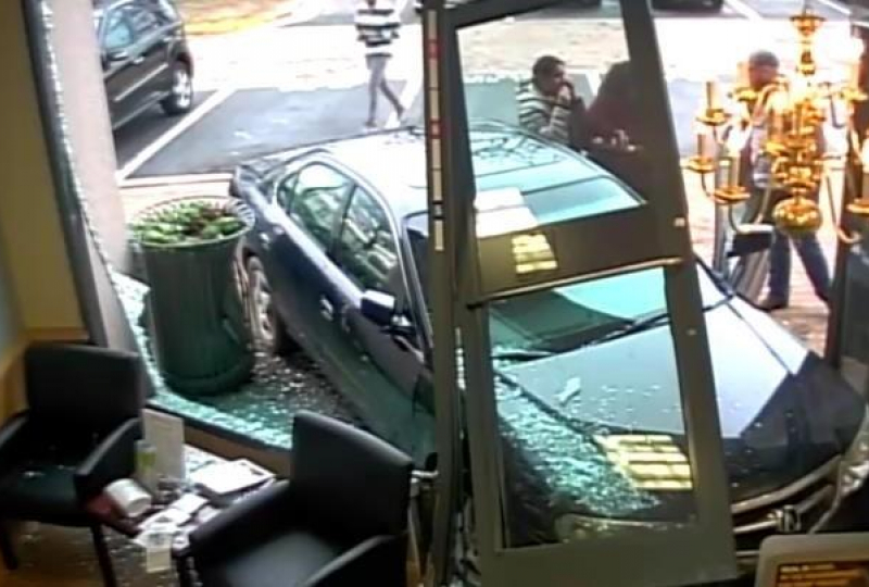 Car drove through storefront